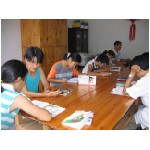 051-Mrs.Wang giving special coaching to student tutors.JPG